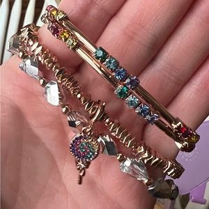 Set of 3. Charm is removable. Rose hold. SRP $132